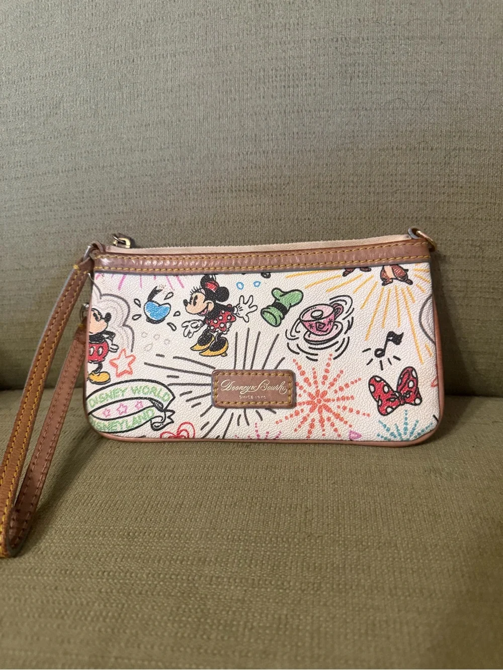 Disney Parks Sketch print wristlet by Dooney & Bourke
